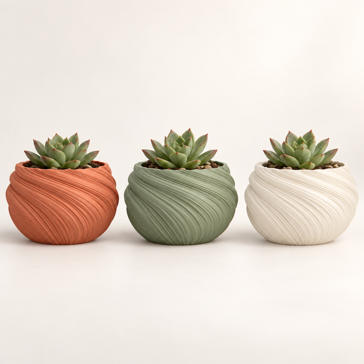 Maceta Twist Redonda 3D en colores terracota, verde salvia y marfil