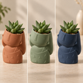 Matera Muñeca Serena 3D en terracota, verde salvia y azul profundo